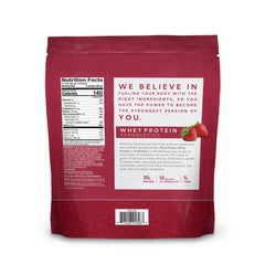 Dr. Mercola Pure Power Whey strawberry shake in glass with probiotic blend