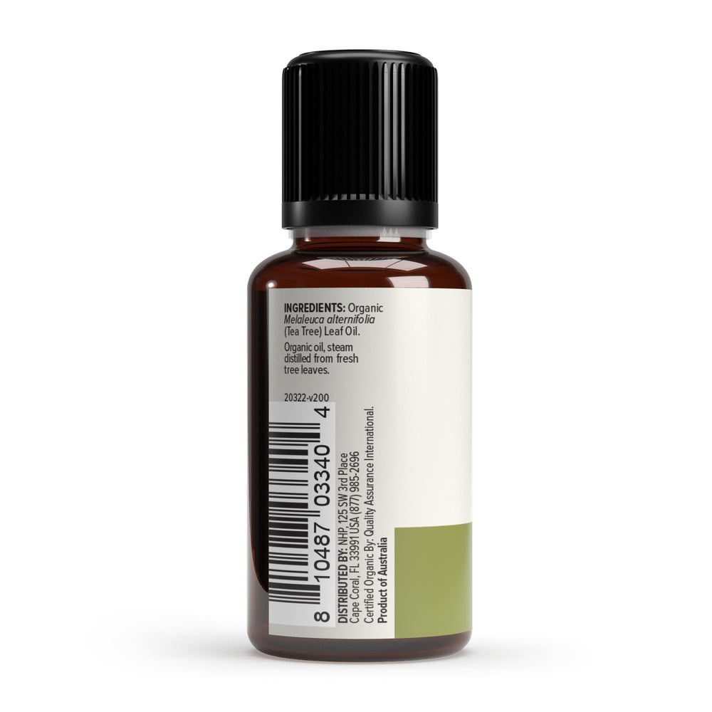Tea tree oil dropper close-up for precise aromatherapy use.