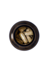 Dr. Nigma Beauty in a Bottle bottle with capsules, highlighting skin-friendly nutrients.
