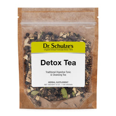 Dr. Schulze's Detox Tea bottle pour highlights the traditional herbal blend.