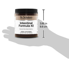 Spoon dispensing the herbal powder for a daily cleanse routine