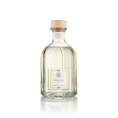 Dr. Vranjes Magnolia Orchidea diffuser bottle enhances elegant room ambiance.