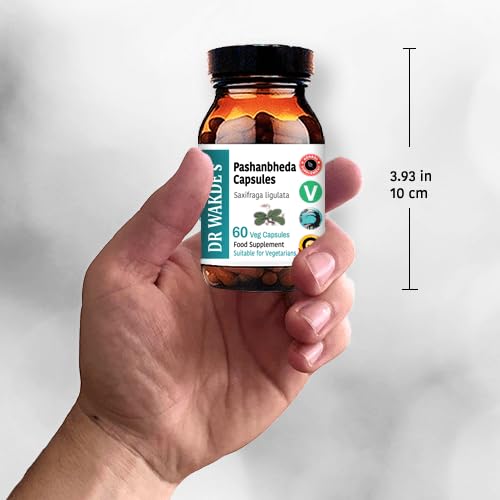 DR WAKDE'S Pashanbheda bottle with glass for serving.