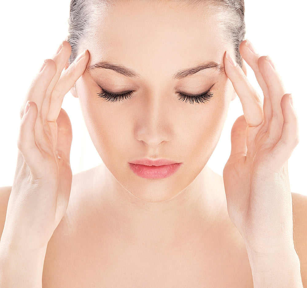 Dropper in hand showing precise dosing for mindful practice with Diamond Mind Drops.