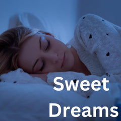Dream Elements Sleep Gummies bottle with glass shows simple, non-habit forming support