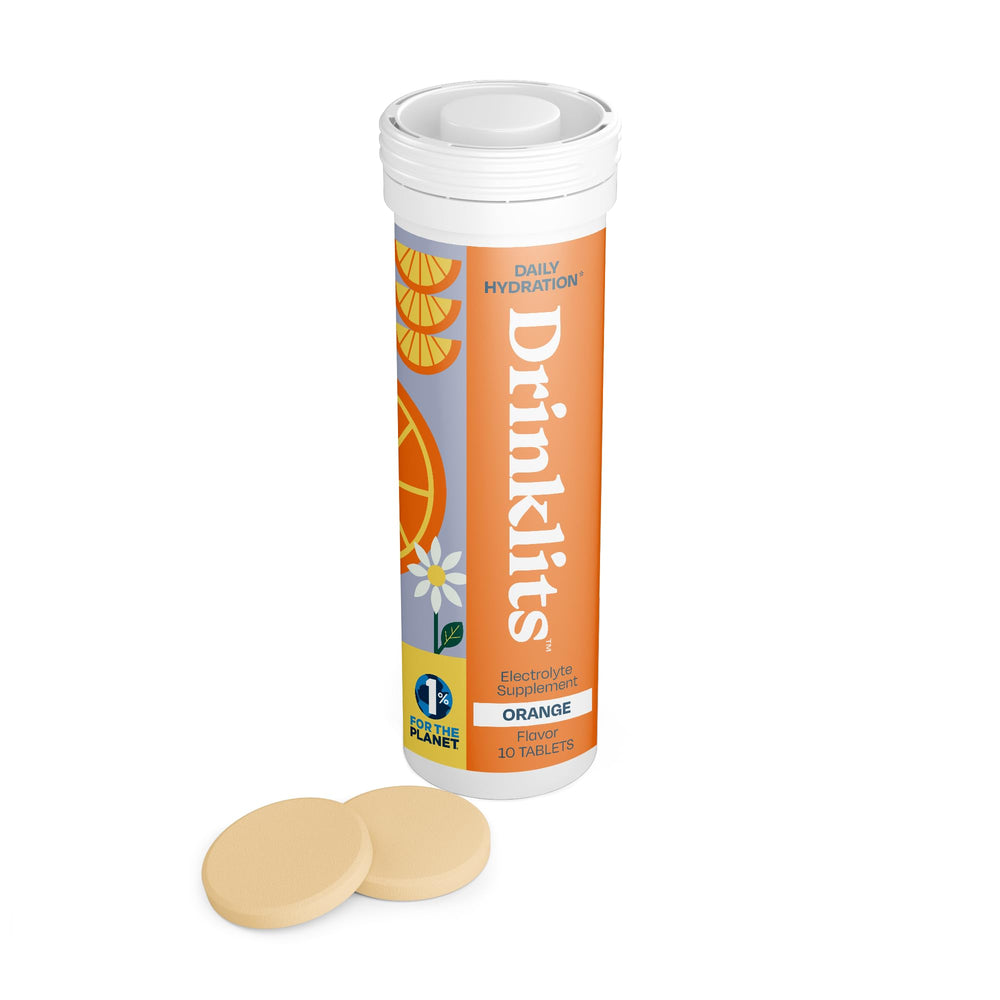 Drinklits Orange tablets in a tube for on-the-go hydration.