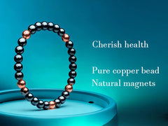 Close-up of copper and hematite beads on a Drkao bracelet, hypoallergenic and stylish.