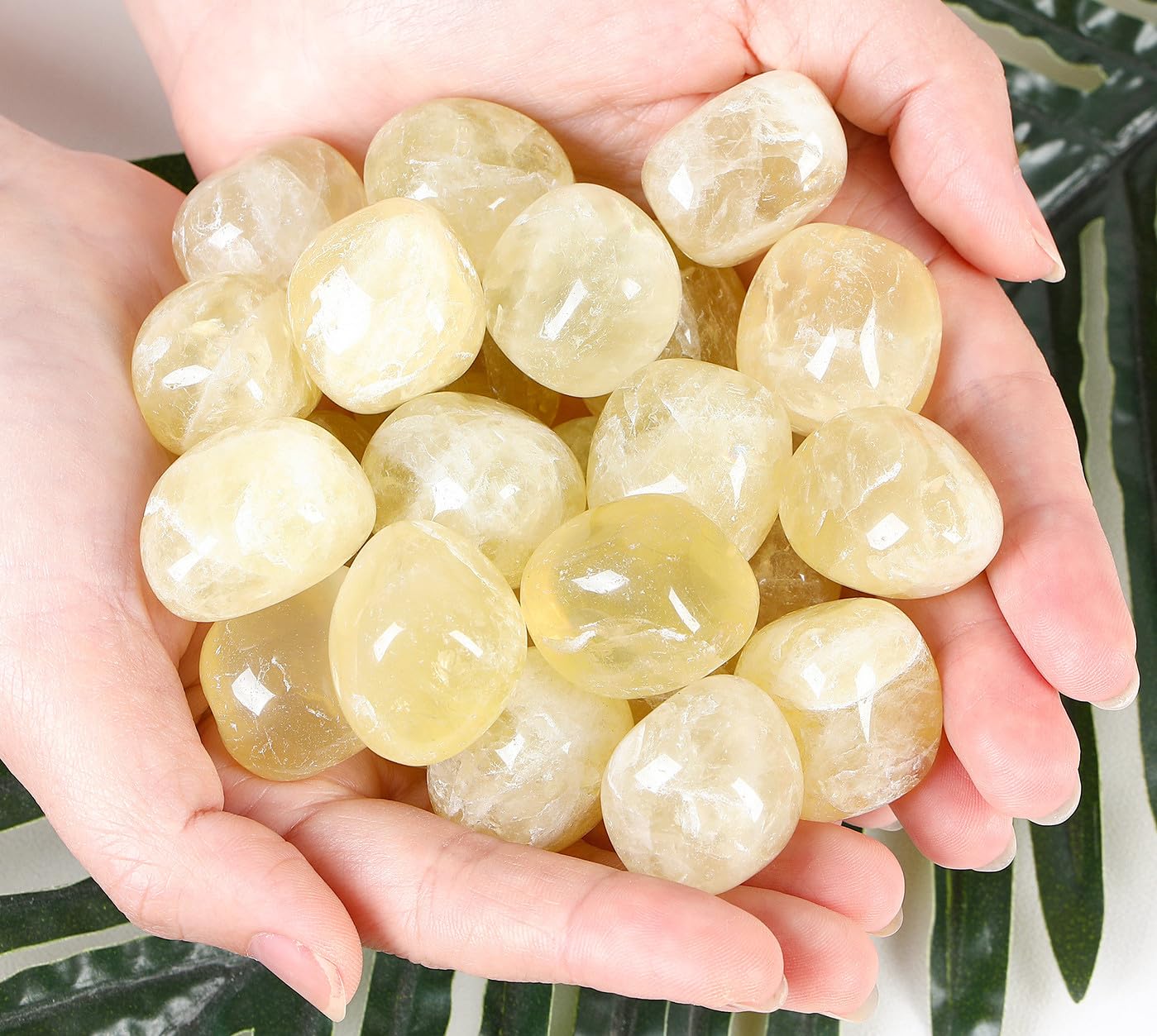 DUQGUHO Citrine crystals close-up tumbled stones, ideal for meditation and focus.
