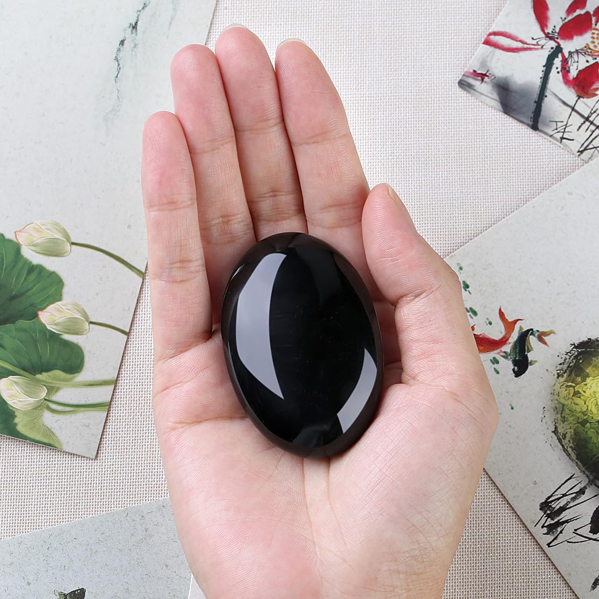 DUQGUHO Obsidian palm stone polished surface highlights natural shine