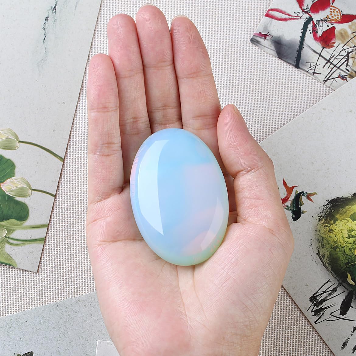 DUQGUHO opalite palm stone packaging with elegant presentation.