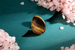 DUQGUHO Polished worry stone crystal in hand supports relaxation and focus.
