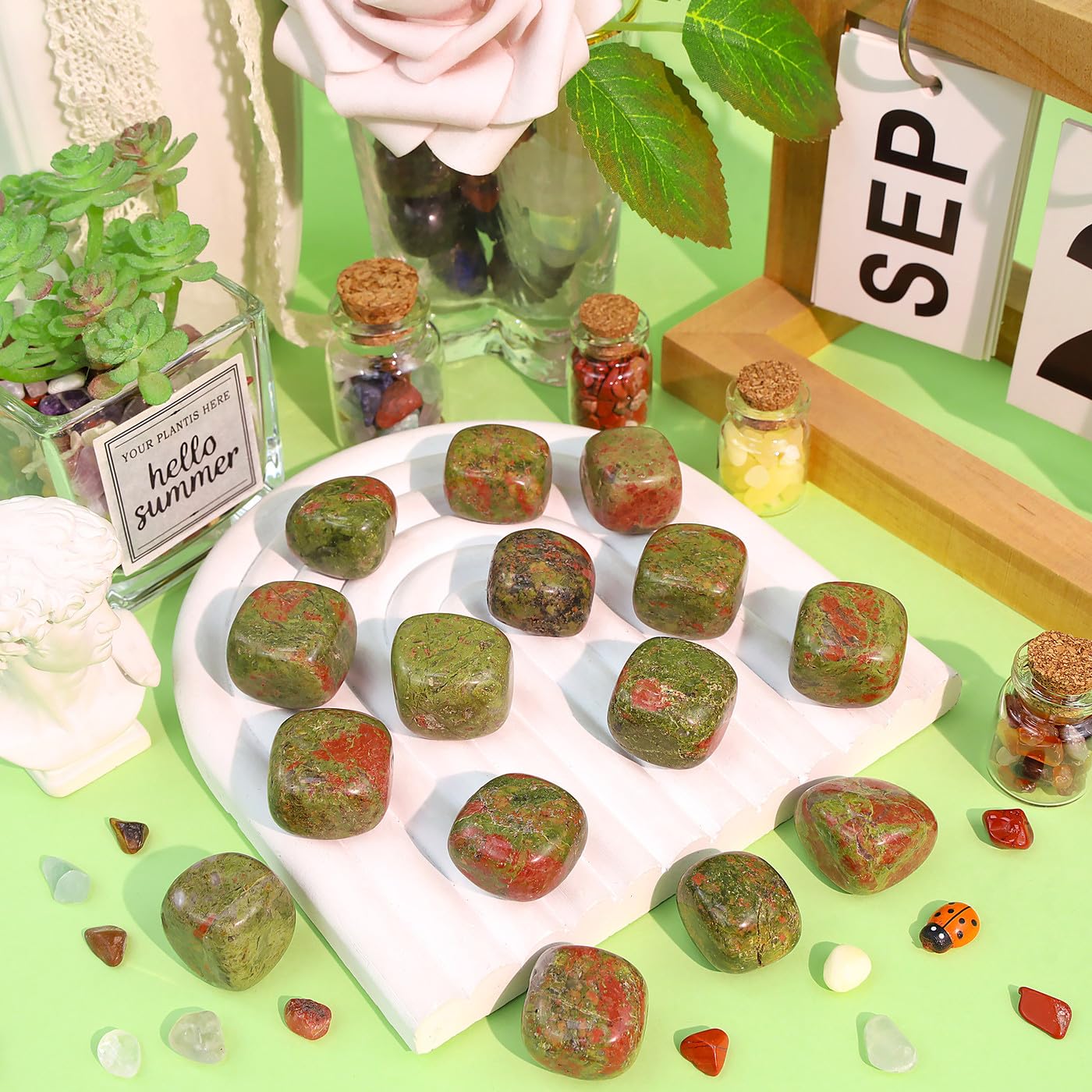 Polished tumbled DUQGUHO Unakite stones for calm focus and meditation.