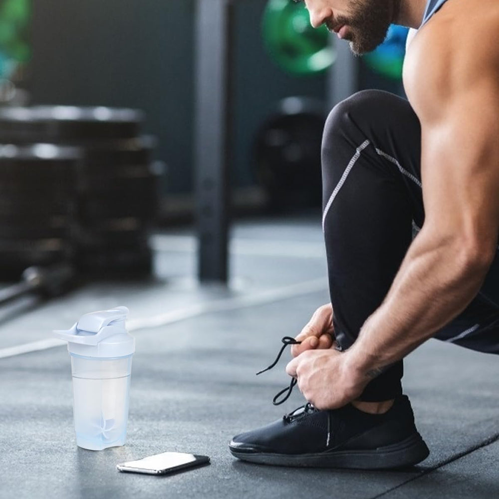 D.Y.A shaker bottle in use during pre-workout routine for on-the-fly nutrition