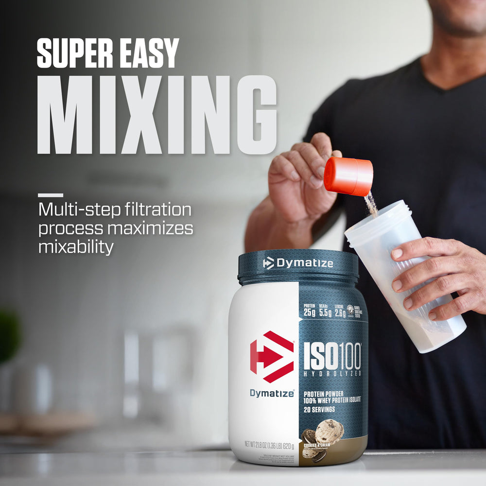 Dymatize ISO100 Cookies & Cream shake in glass showing creamy flavor.