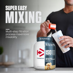 Dymatize ISO100 vanilla pouring shot into a glass for easy mixing