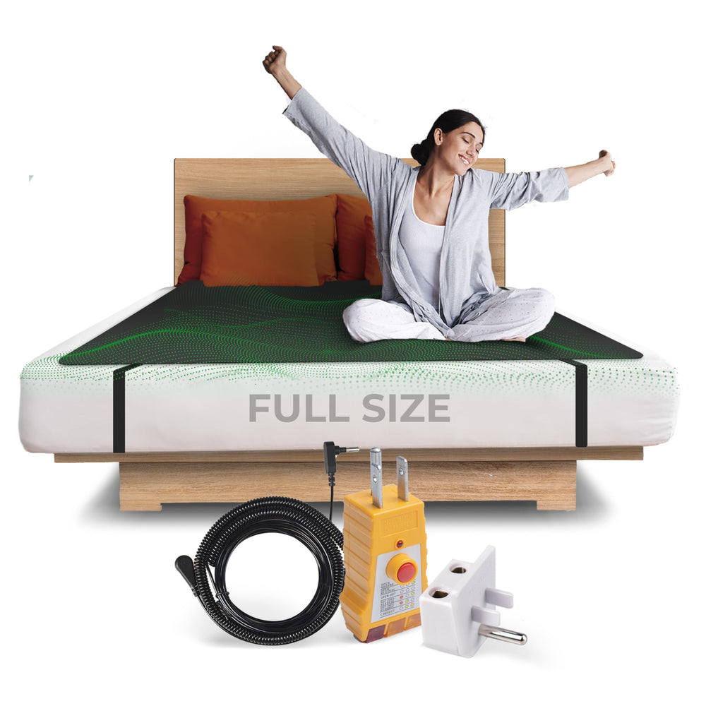 Earth and Moon grounding mat on a queen bed for restful sleep.