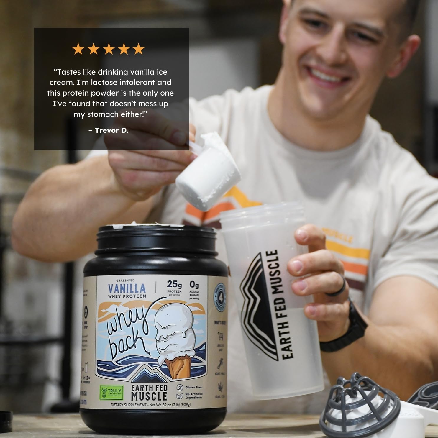 Scoop of Earth Fed Muscle Whey Back vanilla powder ready for blending