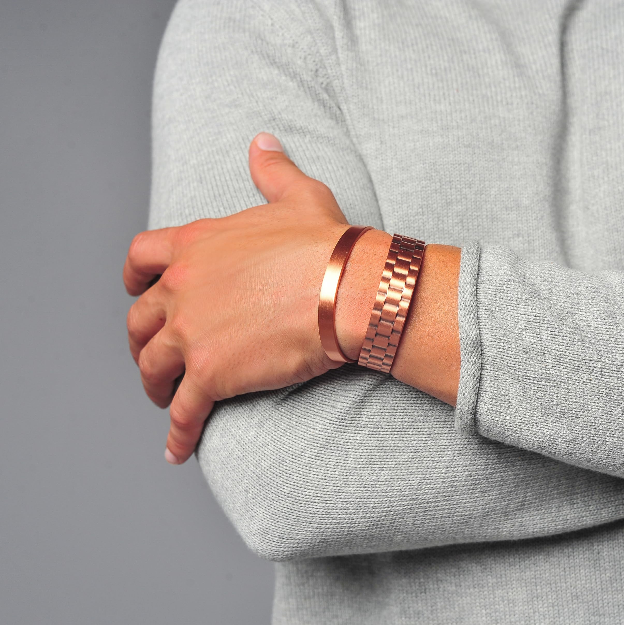 Earth Therapy copper magnetic cuff adjustment close-up for comfortable fit.