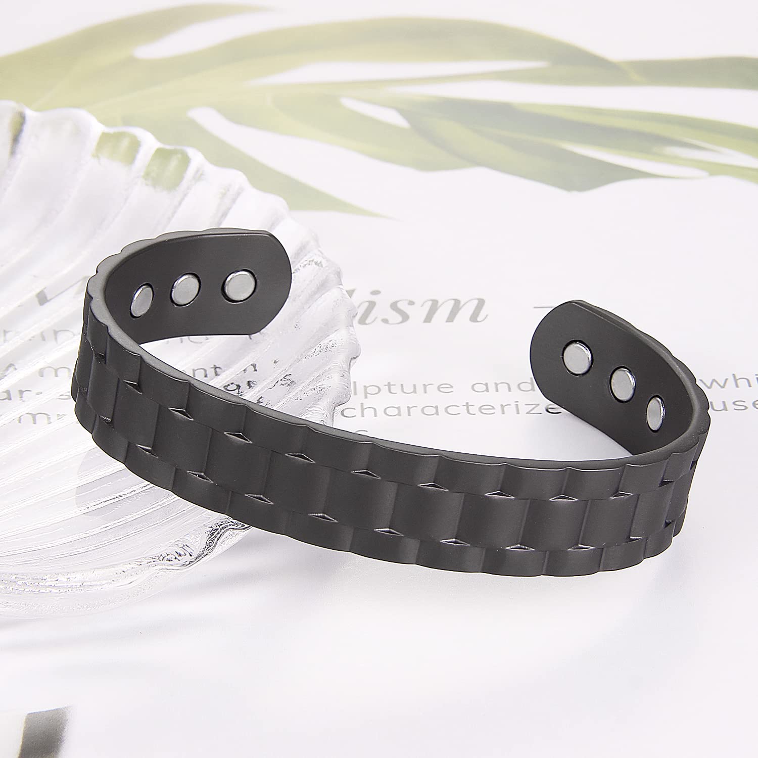 Earth Therapy bracelet with six magnets highlights strong magnetic field around wrist.
