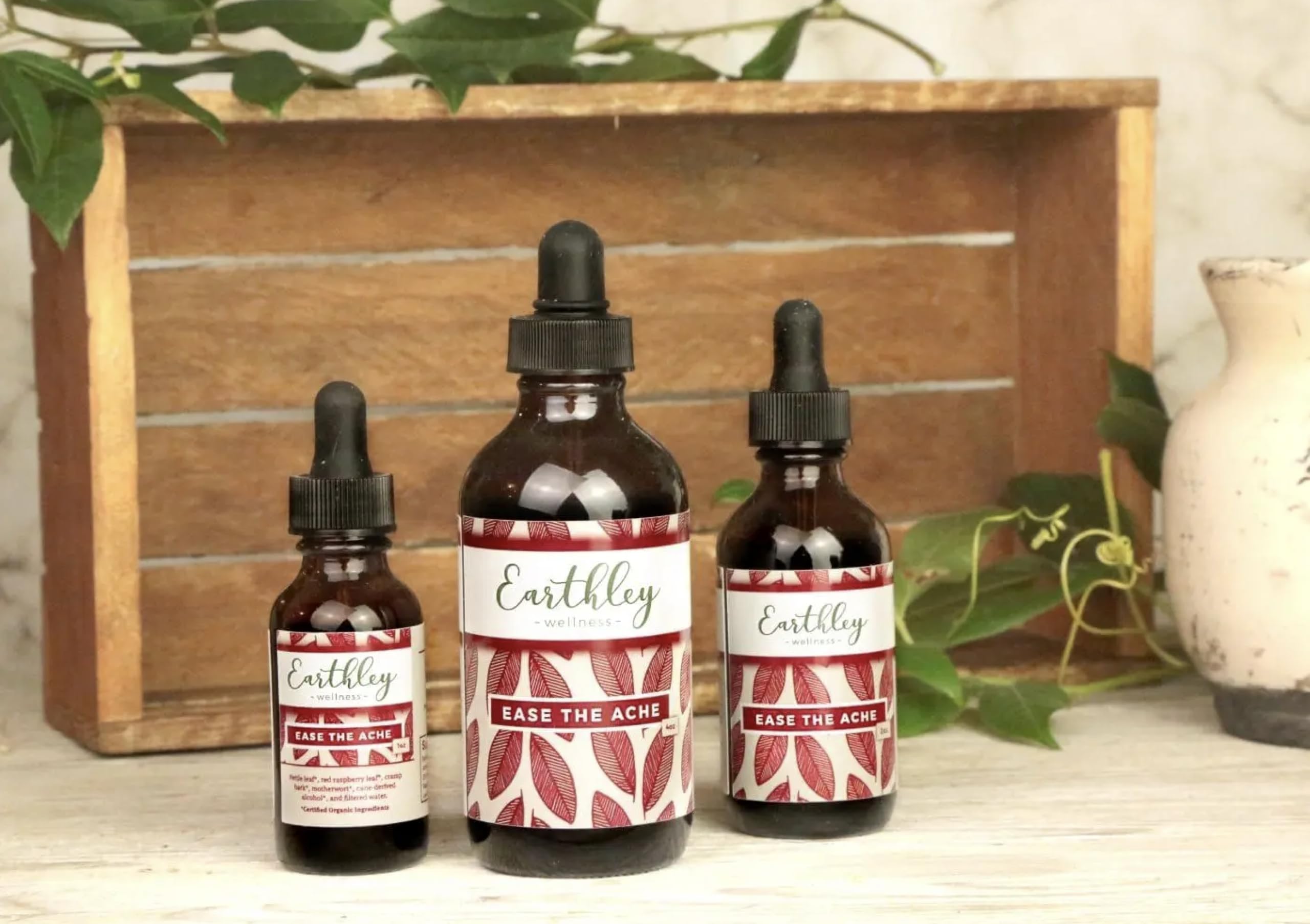 Earthley Wellness Ease the Ache label ingredients list cramp bark and raspberry leaf.