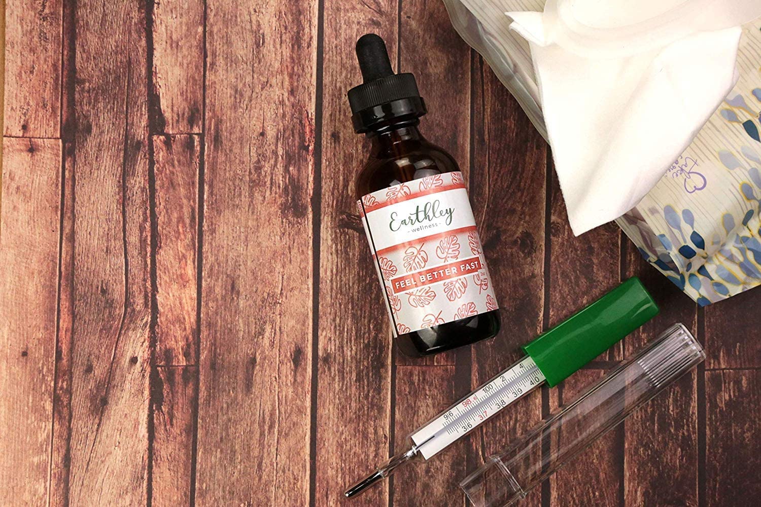 Earthley Wellness Feel Better Fast ingredients closeup, featuring echinacea, fennel, astragalus, elder flowers, cinnamon.