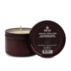 Earthly Body Hemp Seed 3-in-1 candle with warm glow and meltable massage oil.