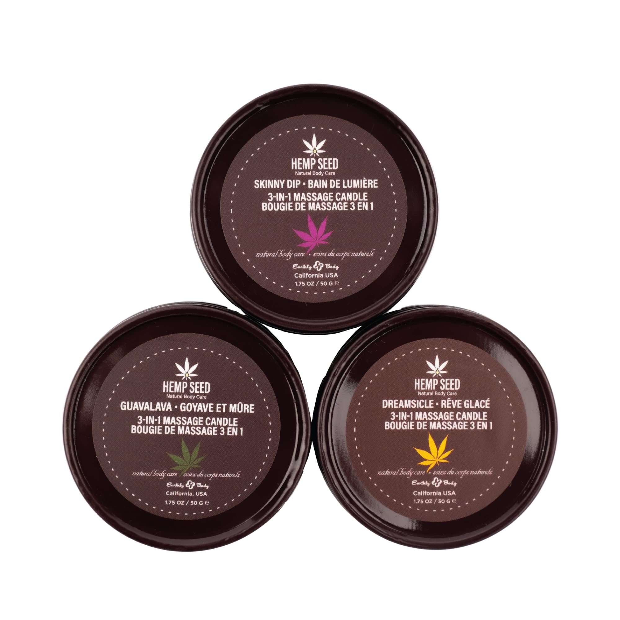 Earthly Body Three Candle Pack lit candles create a cozy spa ambiance.