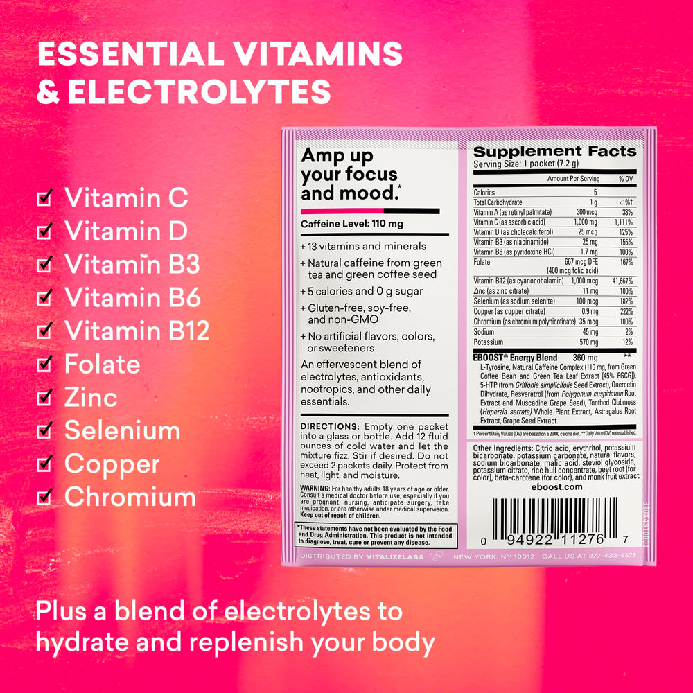 EBOOST pink lemonade packet beside desk setup suggests convenient study and work support.