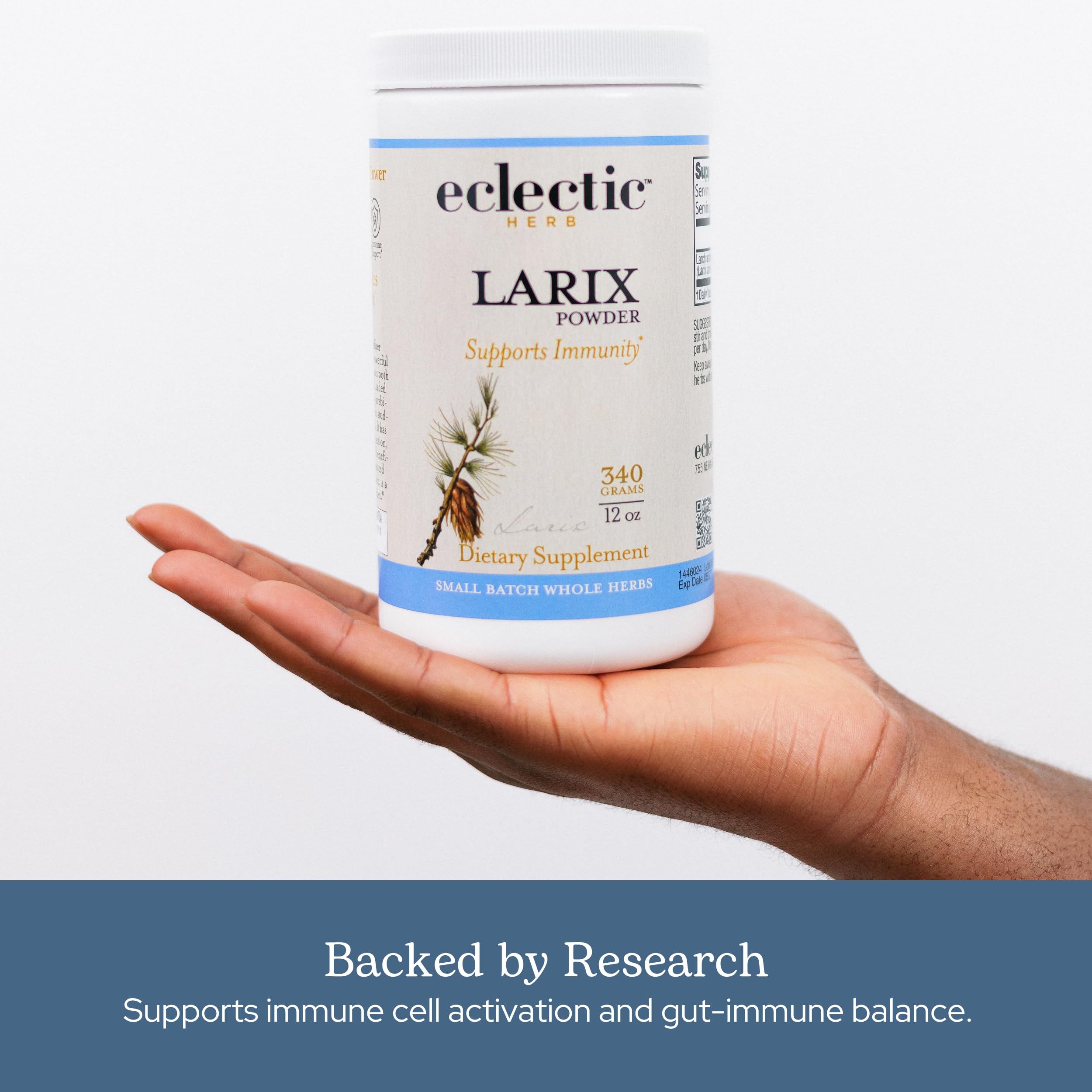Eclectic Institute Larix powder stirred in water to show mixability