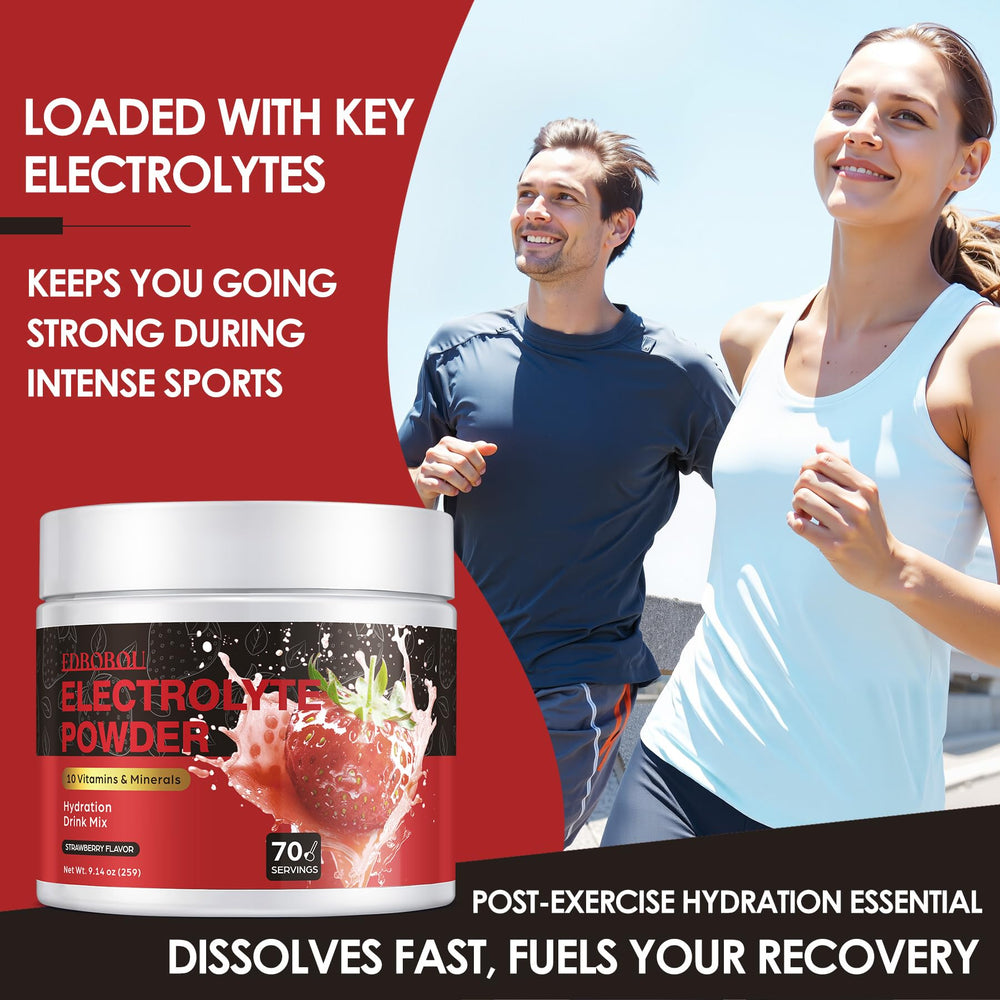 EDBOBOU strawerry electrolyte powder in a glass for hydration after training.