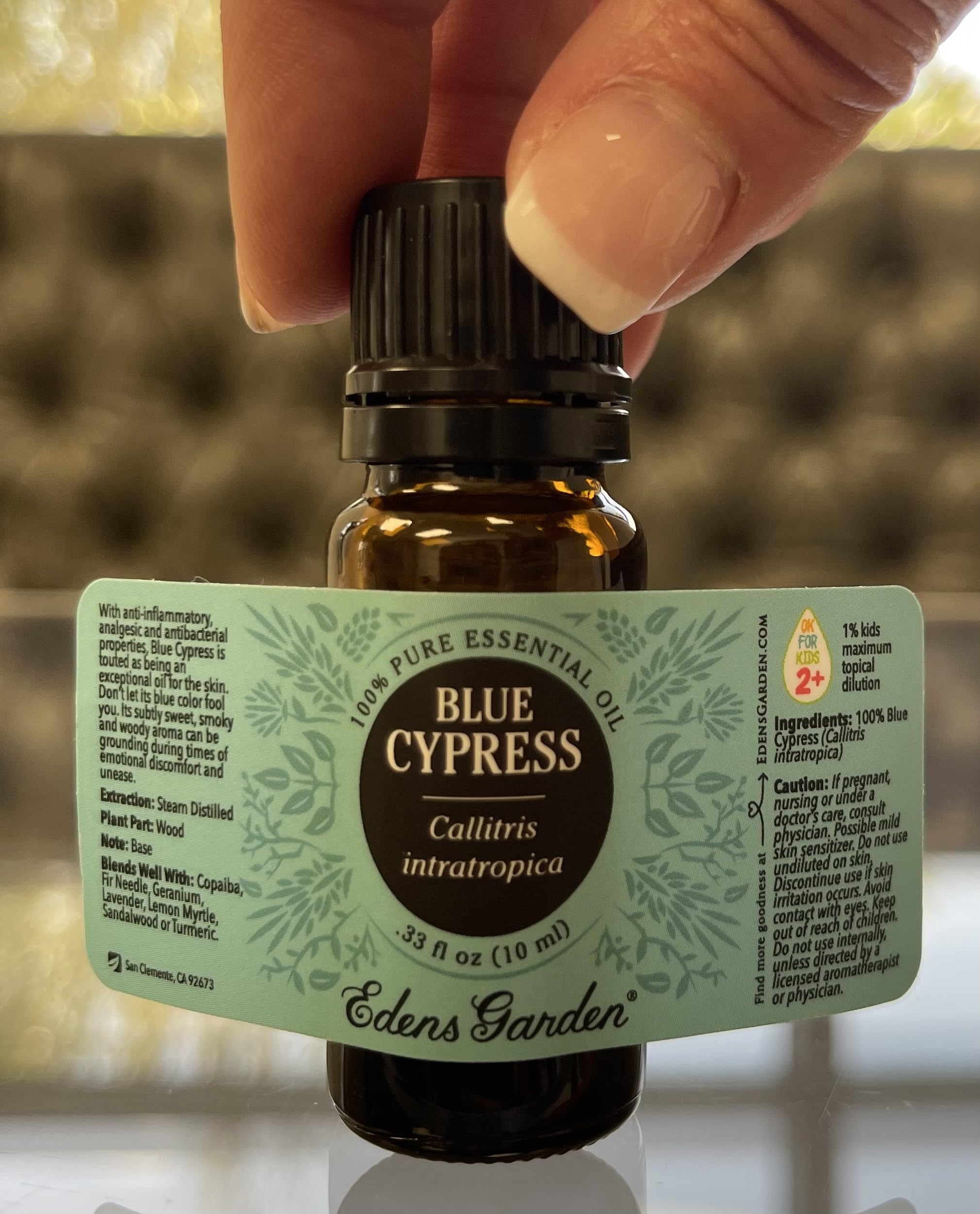 Edens Garden 10ml bottle with clear label and safety features.