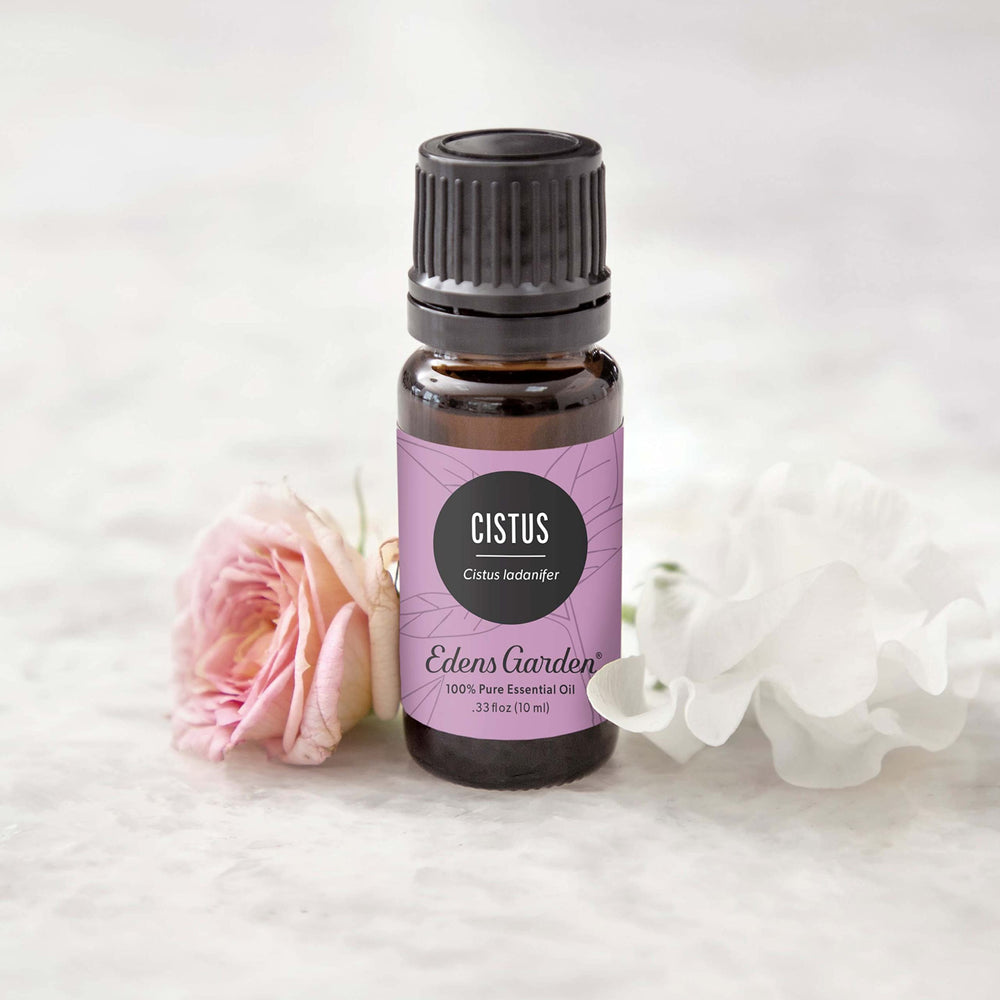 Edens Garden Cistus oil bottle closeup highlighting earthy fragrance notes.