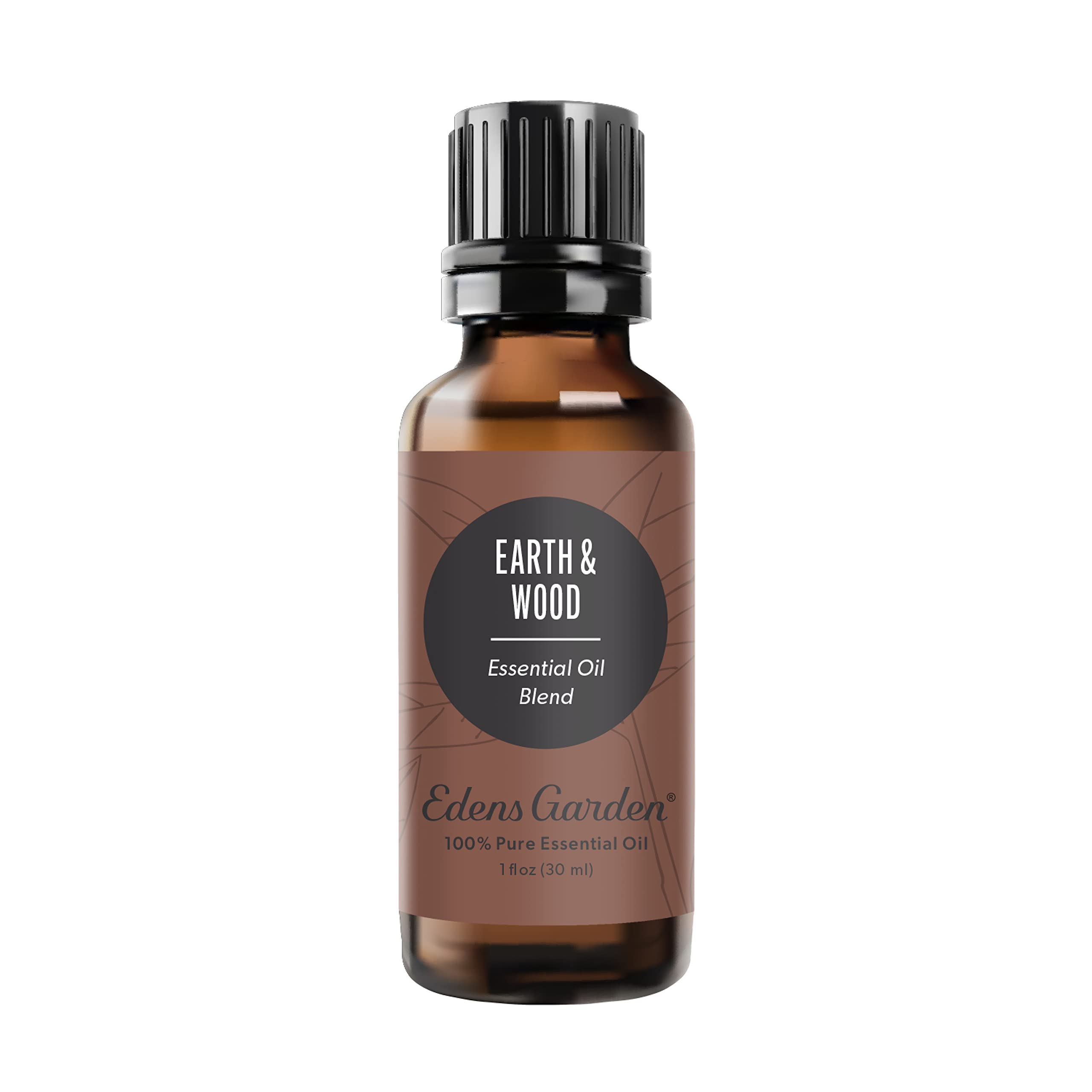 Edens Garden Earth & Wood bottle highlights cedarwood notes for grounding ambiance.