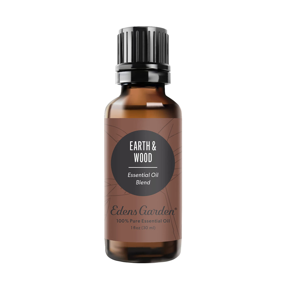 Edens Garden Earth & Wood bottle highlights cedarwood notes for grounding ambiance.