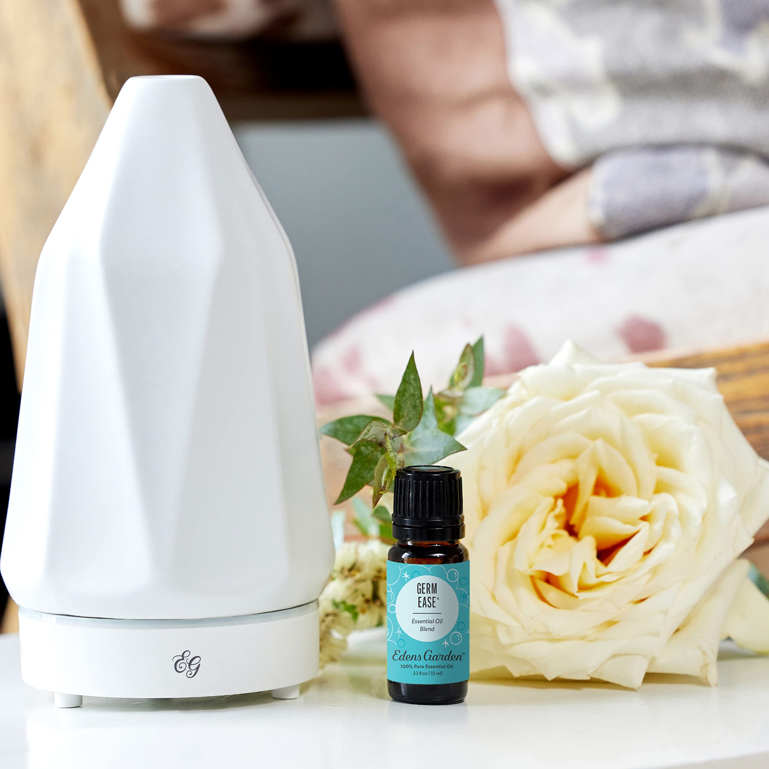 Edens Garden Germ Ease label closeup, showcasing pure essential oil ingredients and premium quality