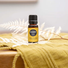 Closeup of Edens Garden Goldenrod oil cap highlighting premium undiluted formula for skin use.