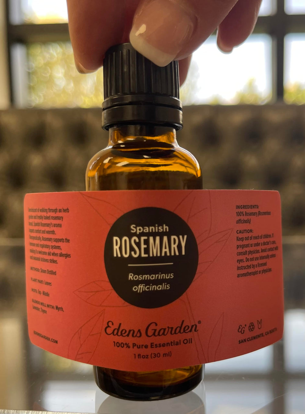 Edens Garden Rosemary Spanish essential oil label closeup showcasing purity