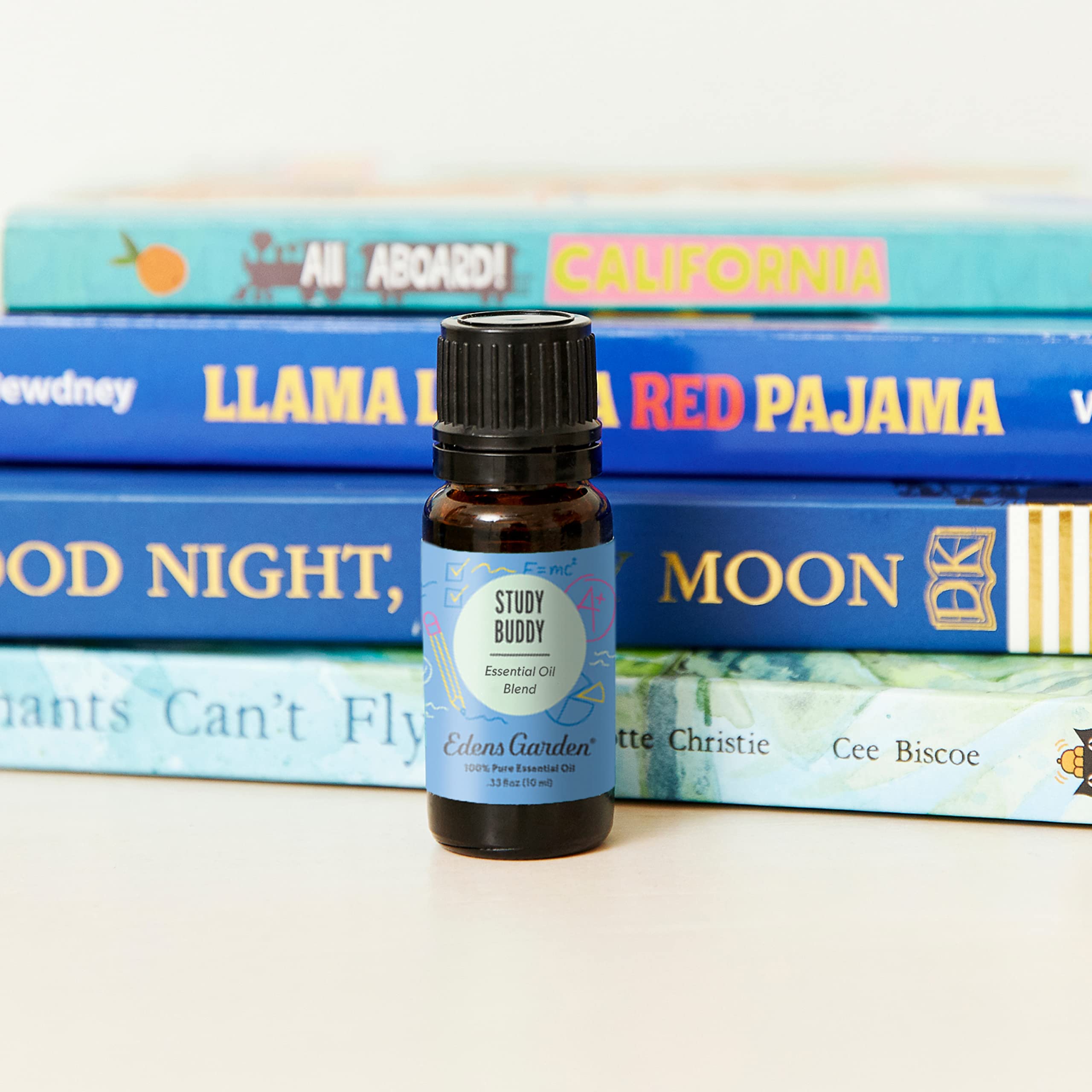 Edens Garden Study Buddy bottle pour showcasing pure essential oil blend.