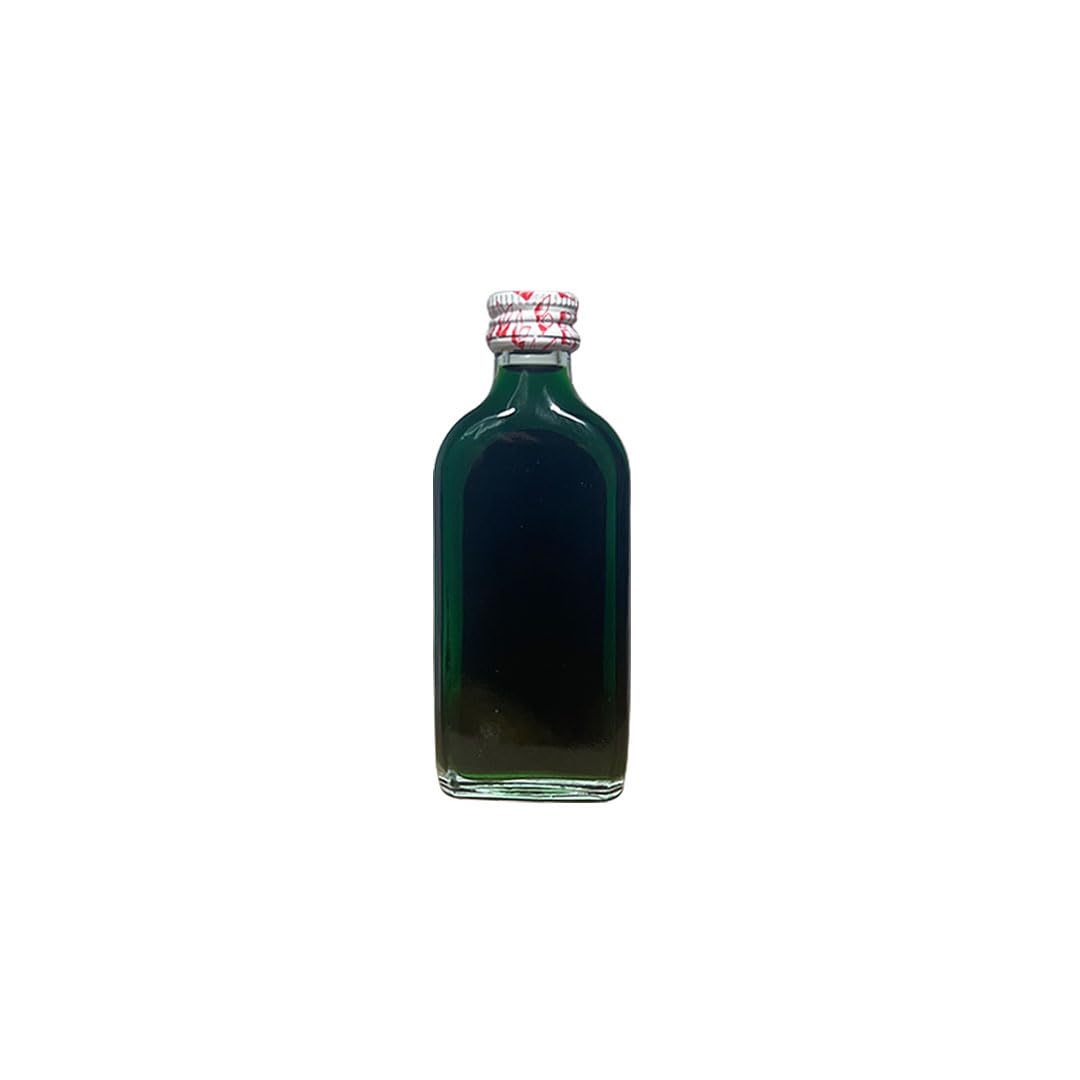 Efficascent Oil pours into the hand, ready to be used for massage.