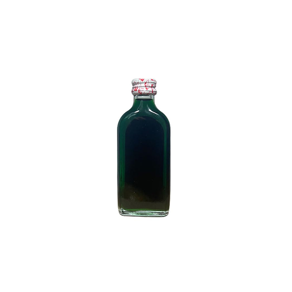 Efficascent Oil pours into the hand, ready to be used for massage.