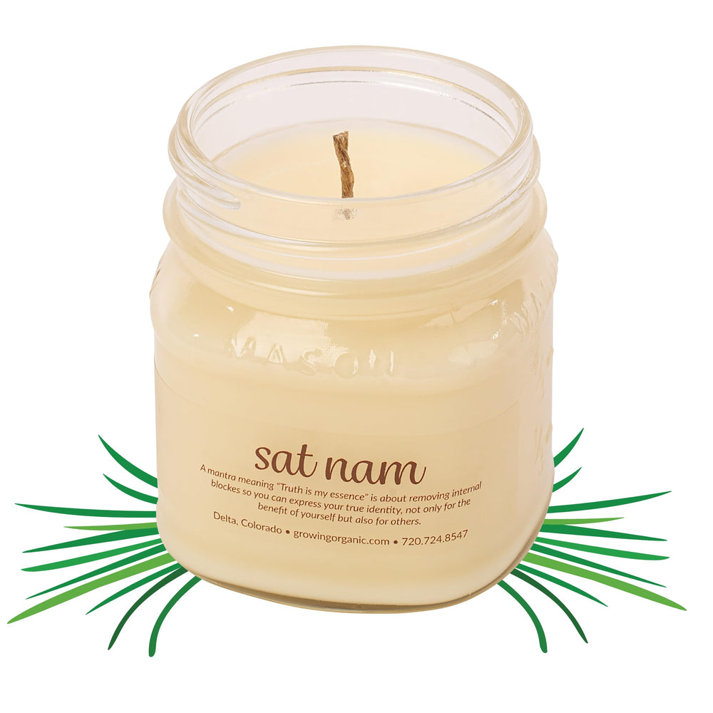 Elemental Wellness glass jar candle with soothing fragrance for meditation.