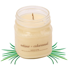 Elemental Wellness Meditation Candle in vetiver-cedarwood jar for calm focus.