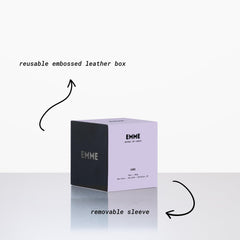 EMME NYC wood-wick candle crackles softly while filling the room with scent.