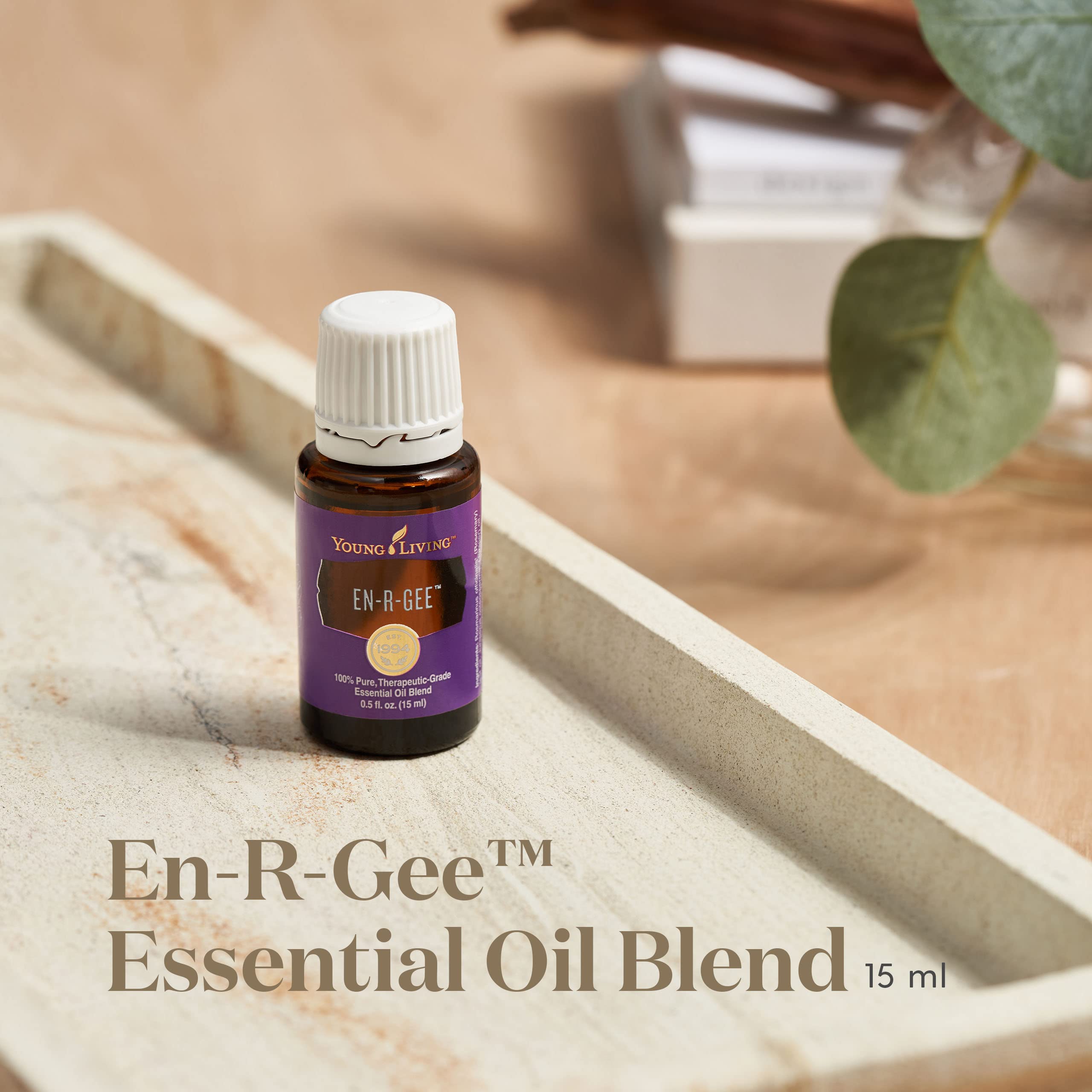 En-R-Gee bottle pour illustrating easy on-the-go energy through aromatherapy