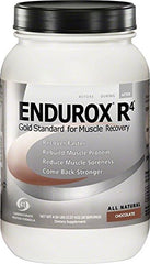 Endurox R4 chocolate drink in glass ready to mix after workouts to support endurance