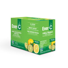 Ener-C glass of water with dissolving Lemon Lime packet for daily vitamin intake.