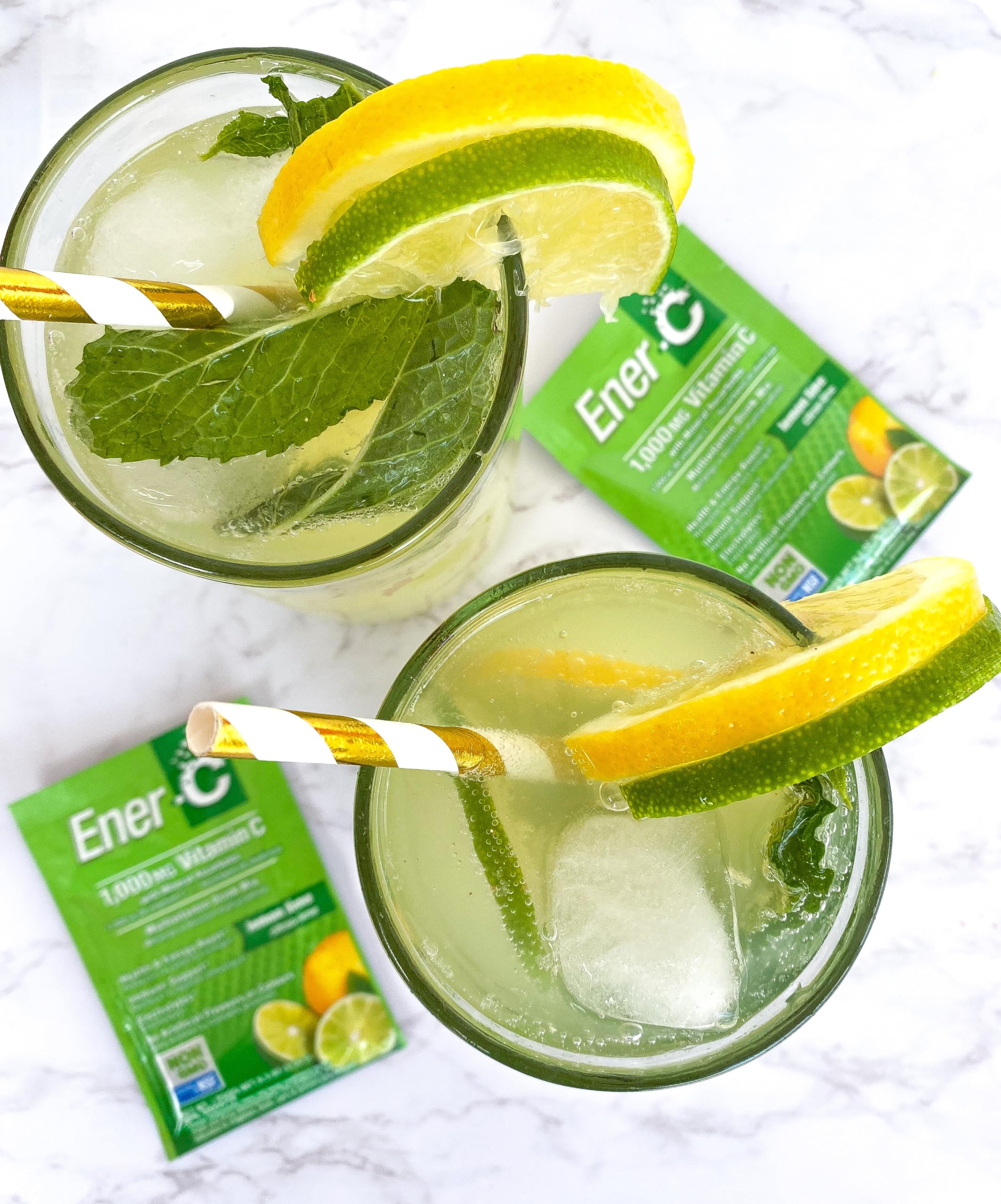 Ener-C spoon mixing powder into water for quick, easy preparation.