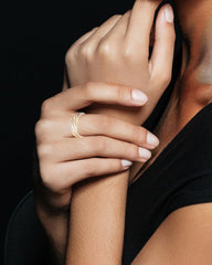 EnerCoppeX adjustable open-design ring shown on finger for easy resizing.