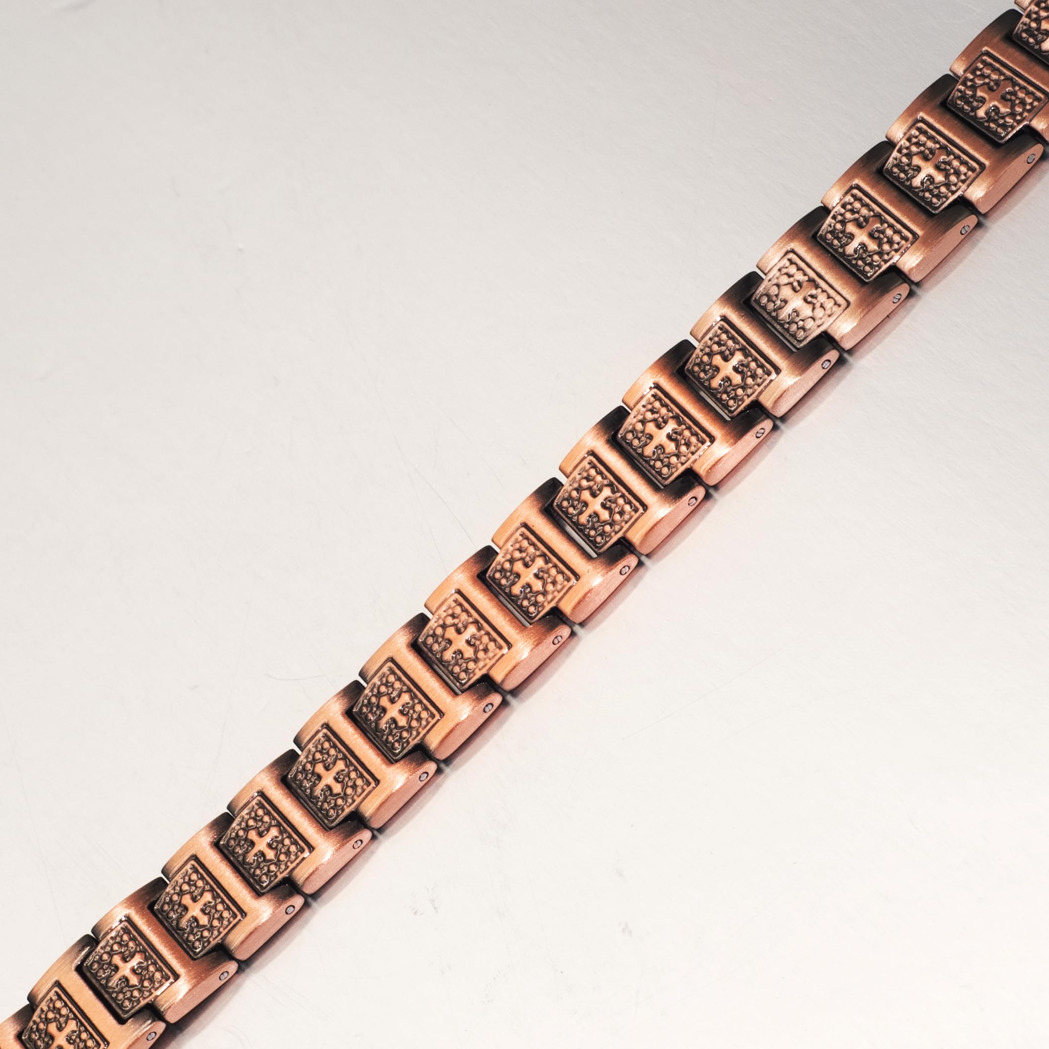 EnerCoppeX stylish mens bracelet on wrist complements casual and formal outfits.