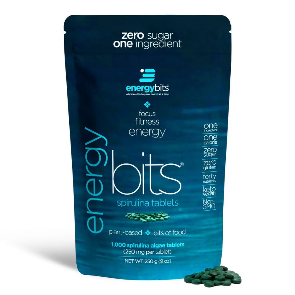ENERGYBITS spirulina tablets close-up for high-protein plant fuel.